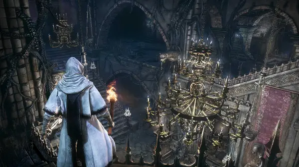 A first-person perspective view of a hunter walking through the dark, fog-filled streets of Yharnam in Bloodborne.